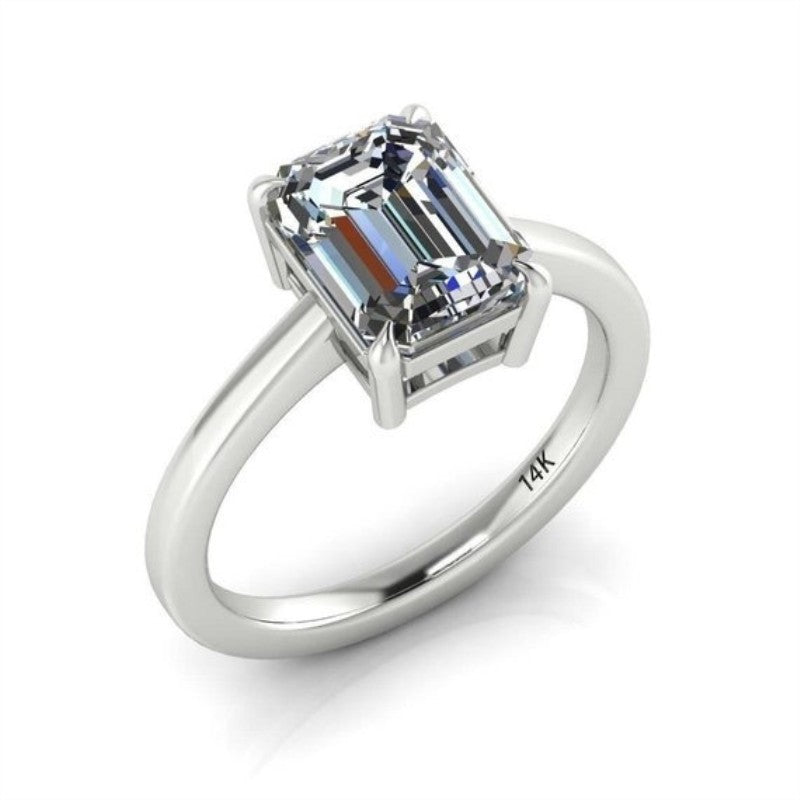 Moissanite four-claw shaped emerald engagement ring